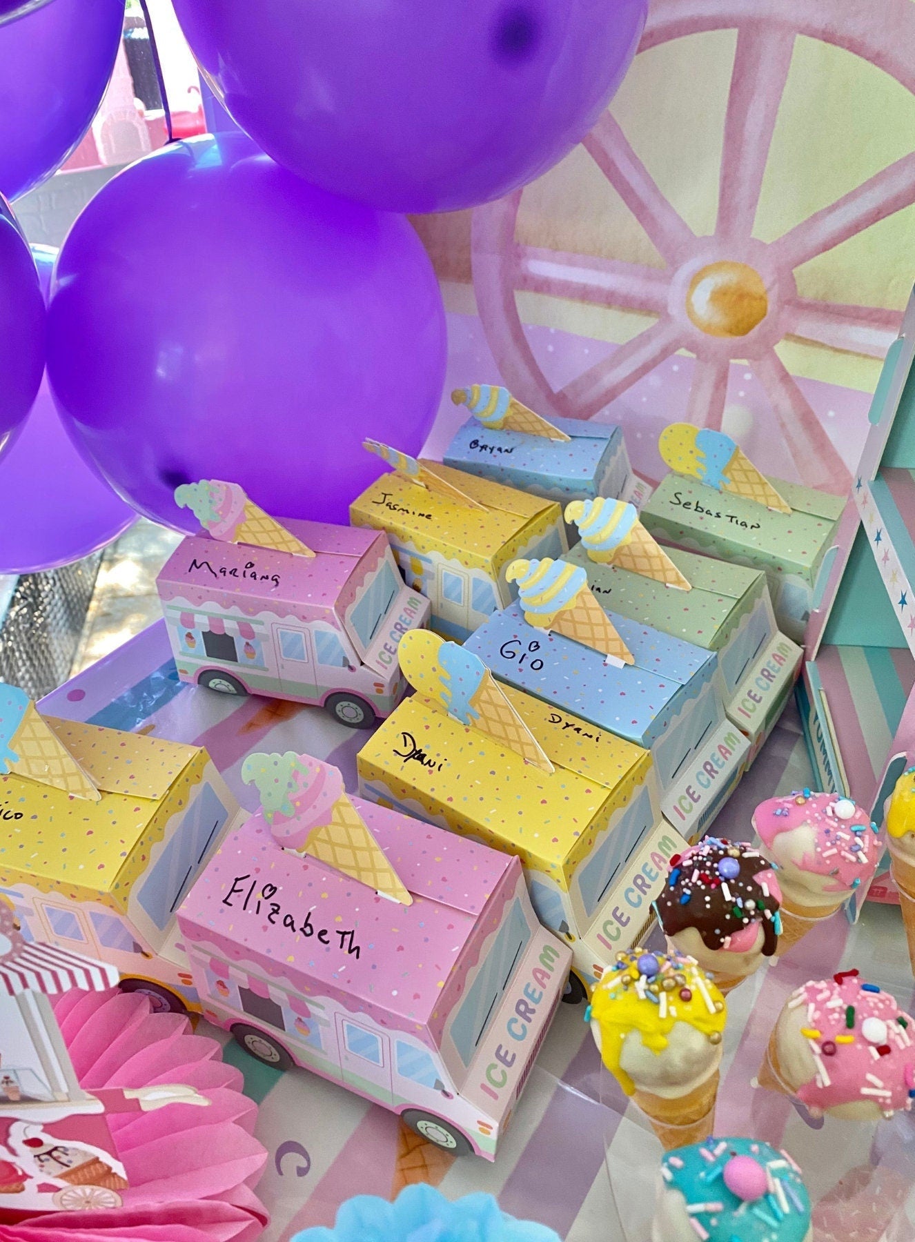 Step-by-step assembly guide showing how to fold pastel ice cream truck favor boxes.