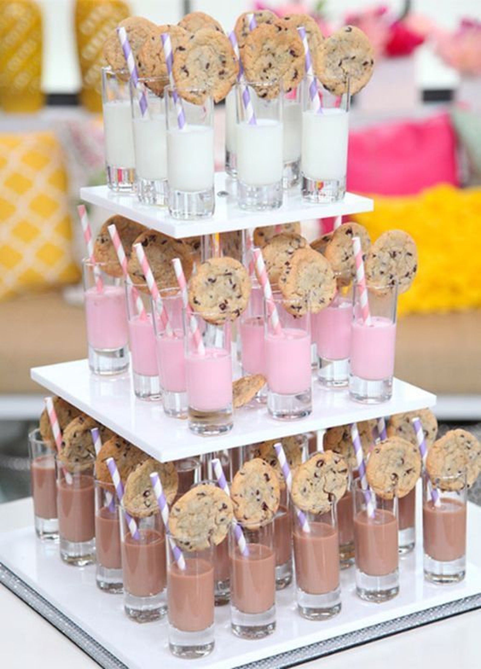 Tray of 3 oz clear acrylic dessert cups with milk and cookies and pink striped straws