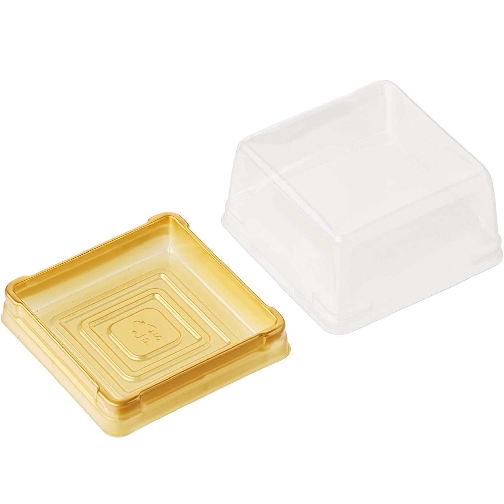 Set of gold base macaroon boxes with clear square lids, separated for detailed view.