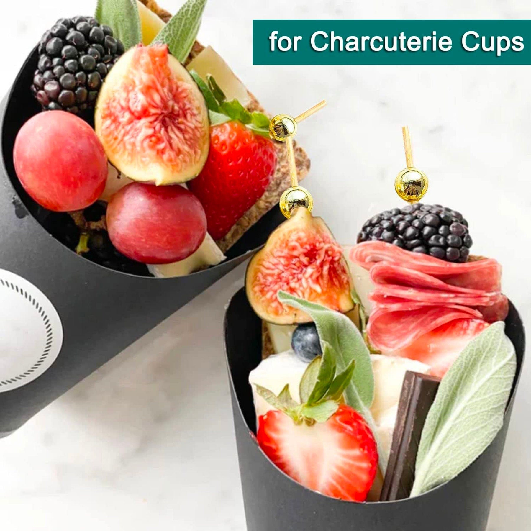 Wedding grazing table appetizers styled with gold charcuterie toothpicks