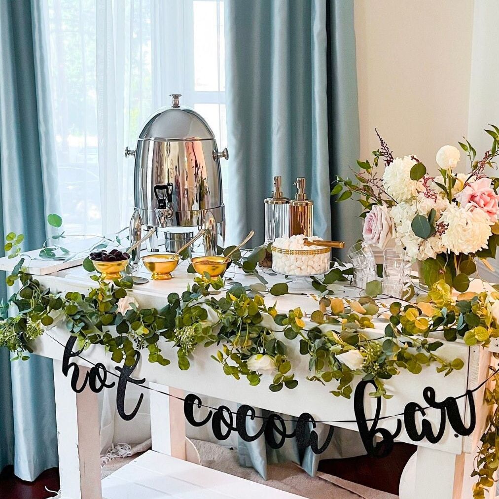 Complete hot cocoa bar kit setup for 20 guests on a table