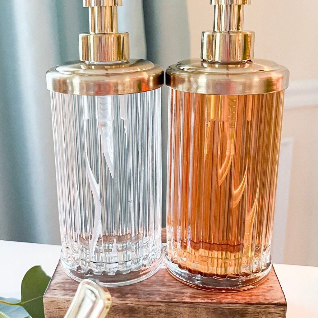 Acrylic syrup dispensers labeled for chocolate and caramel sauces