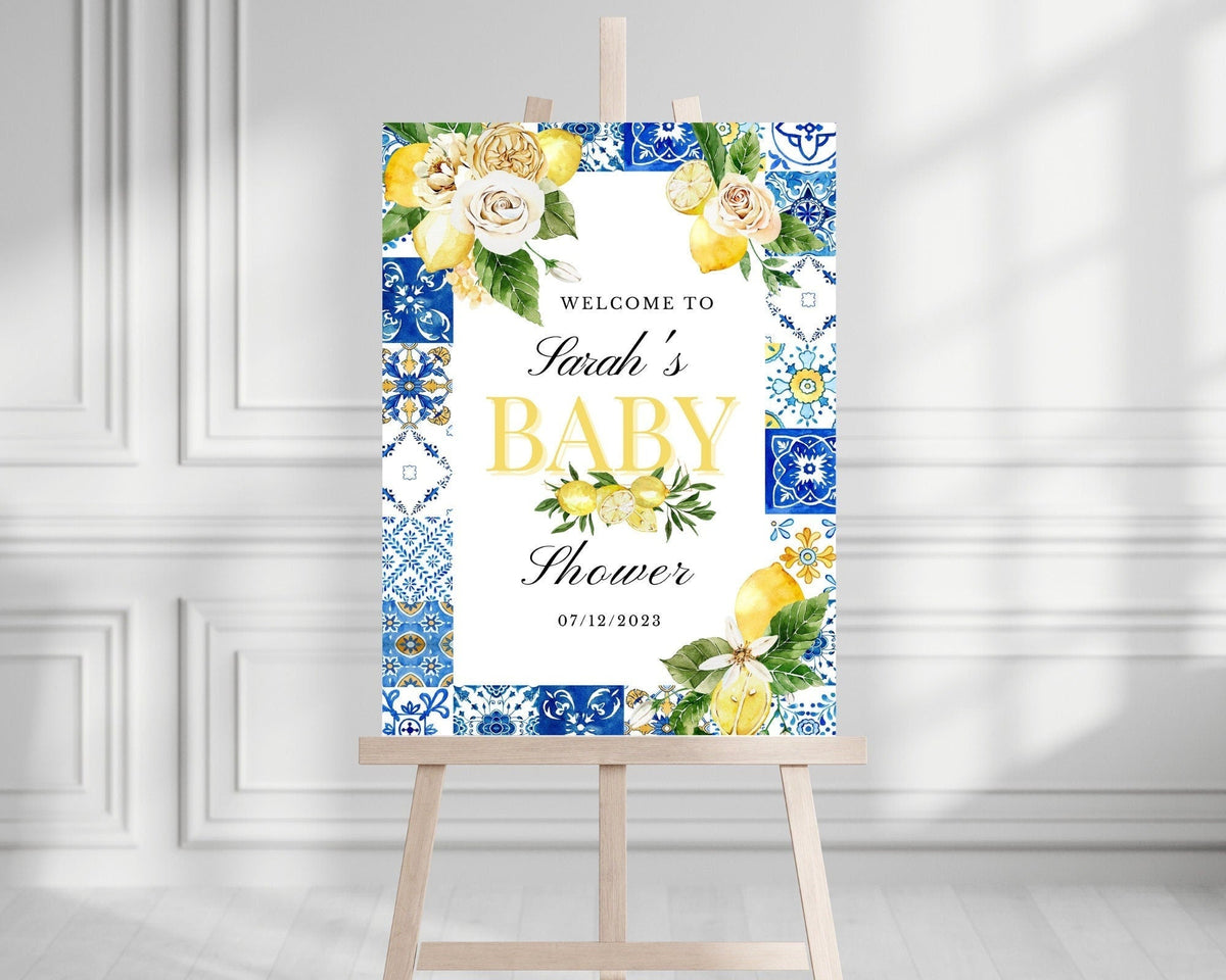 Lemon and White Rose themed "Welcome to Sarah's Baby Shower" sign with blue Italian tile design border.