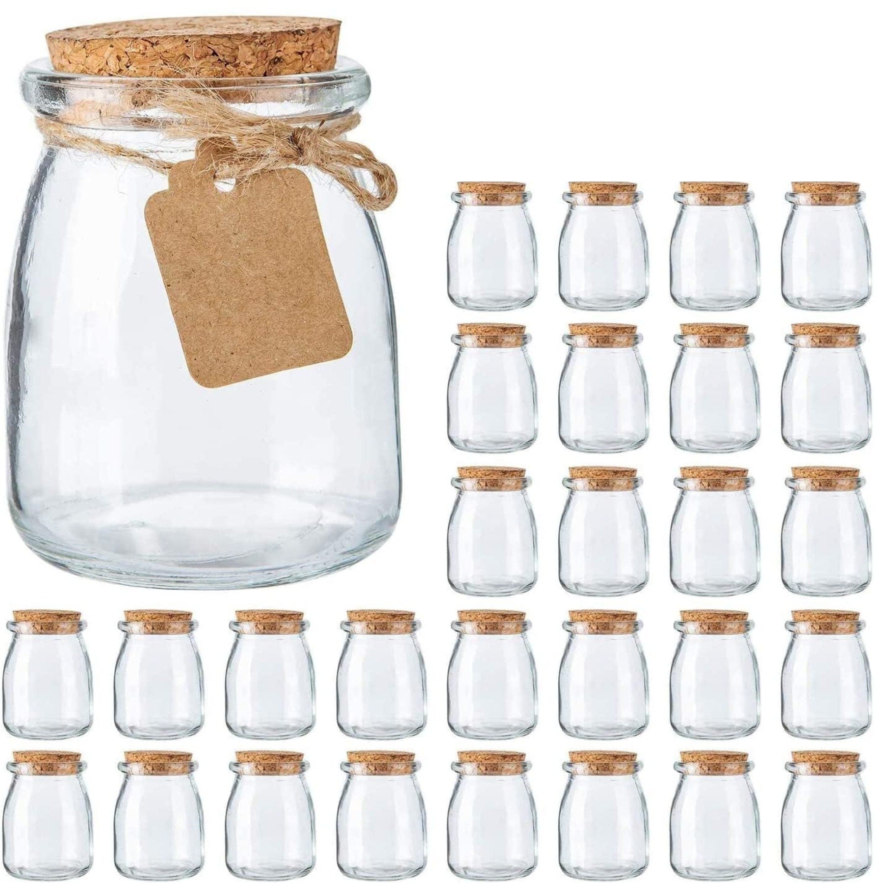 Set image showing multiple mini glass jars with cork lids and one jar with tag