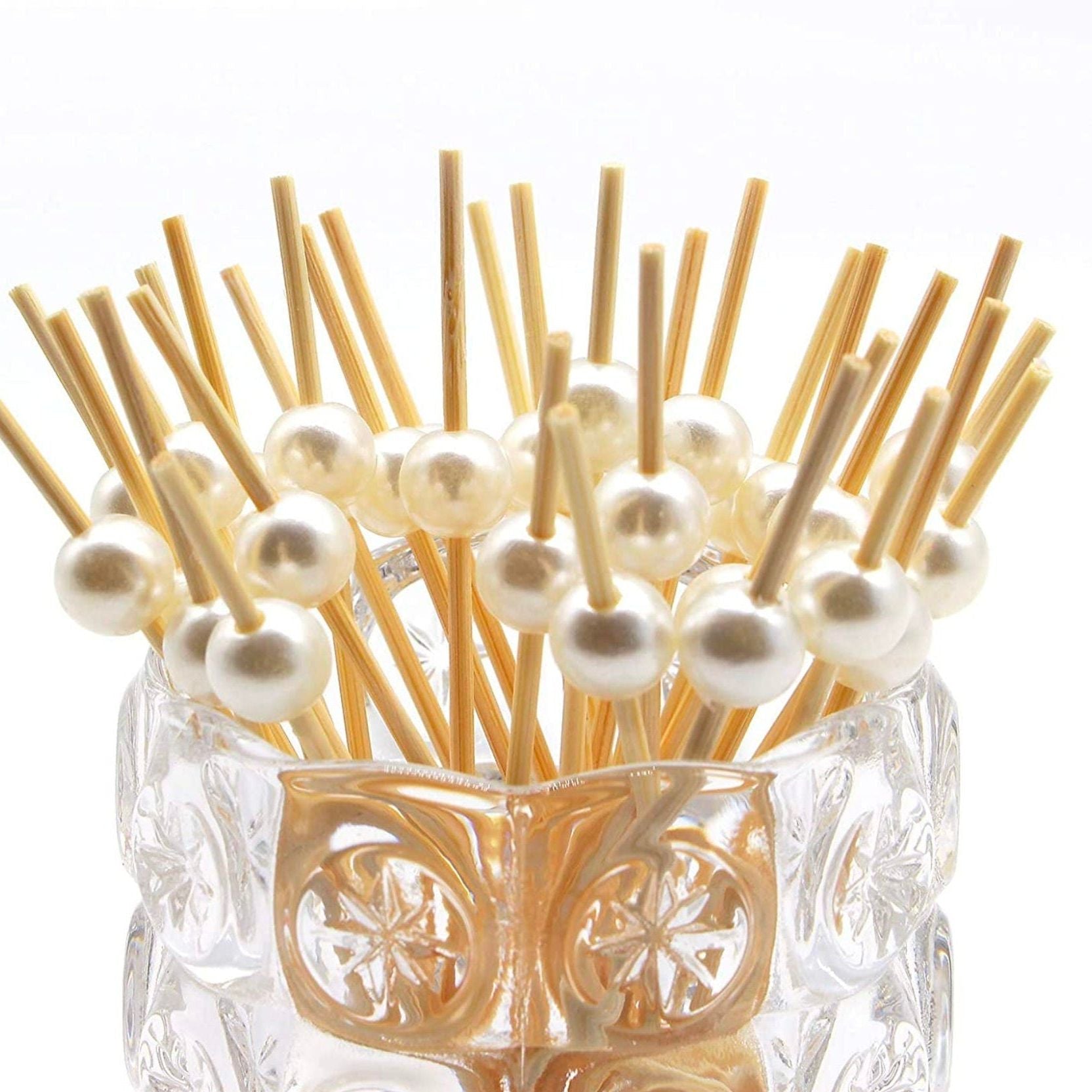Elegant pearl bamboo toothpicks arranged for serving appetizers
