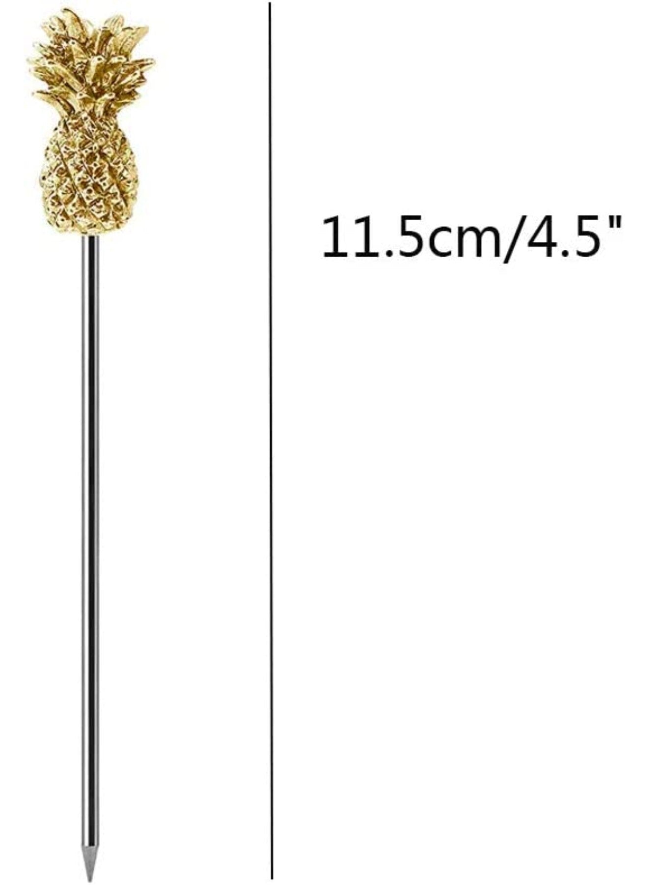 Single pineapple swizzle stick next to measurement showing 11.5 cm length