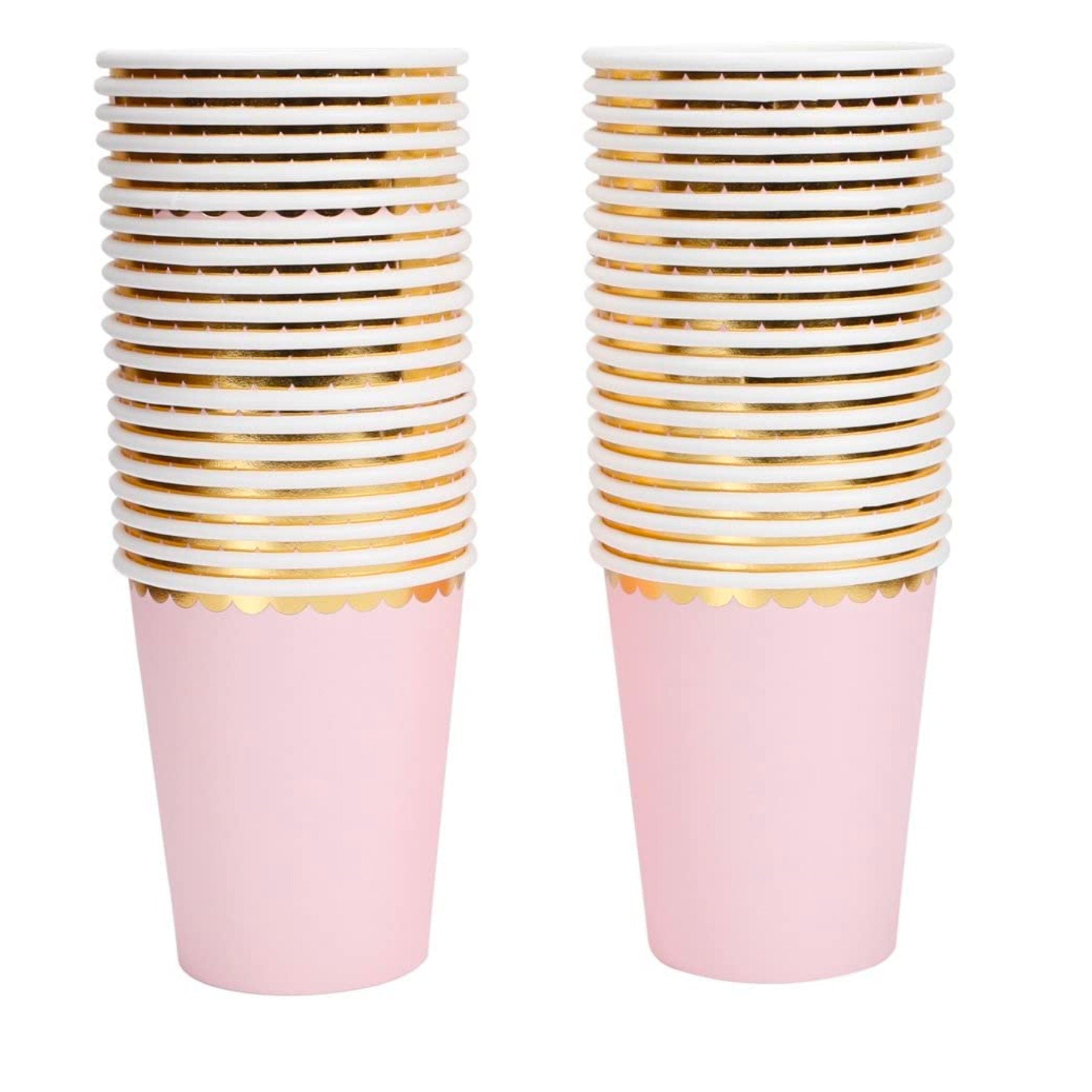 Stack of blush pink cups with metallic gold bands