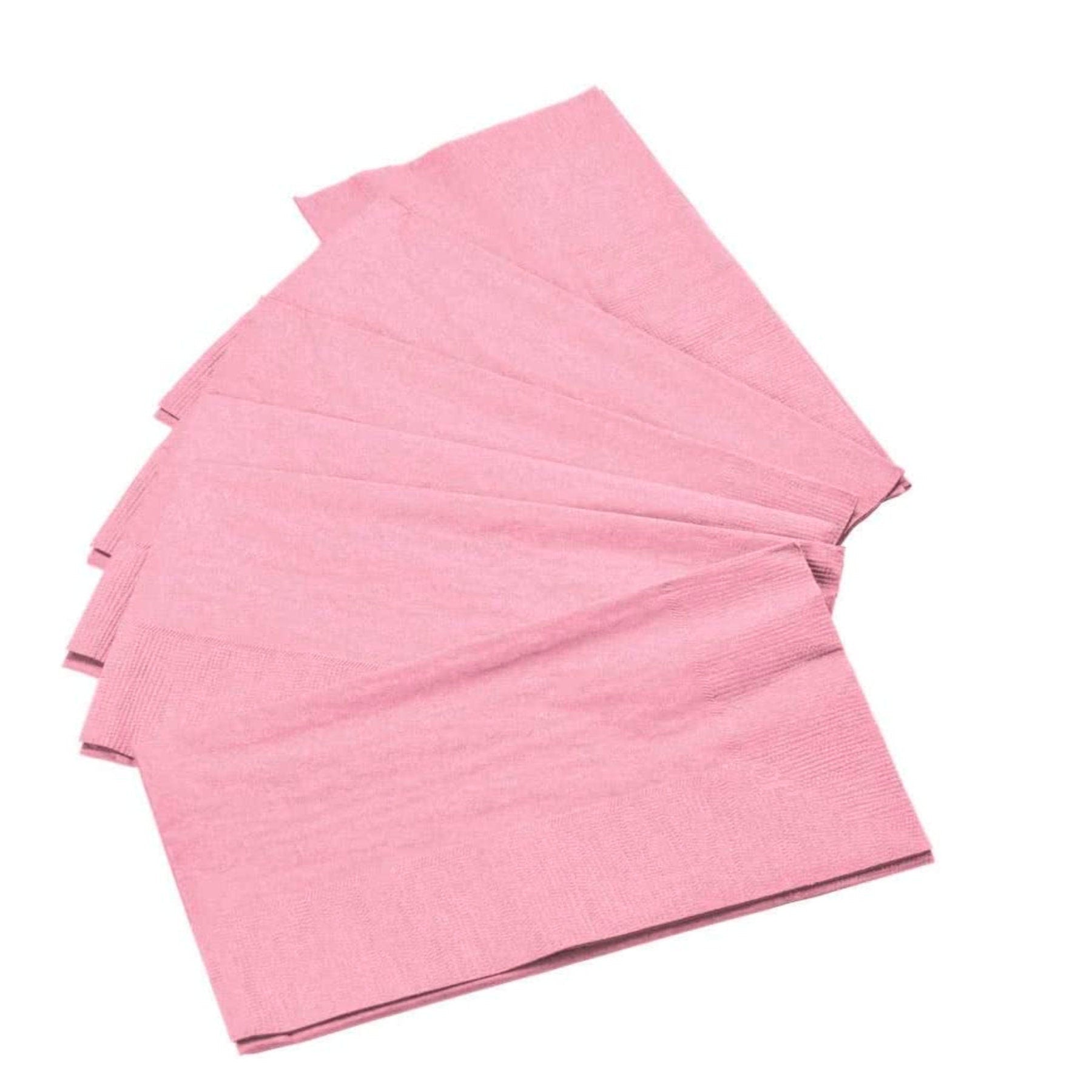 Soft pink dinner napkins arranged in a fan