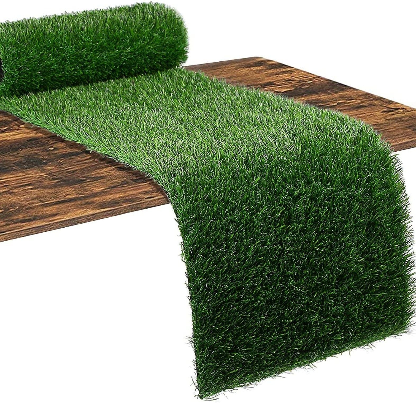 Roll of faux grass table runner for tabletop decoration and party setups