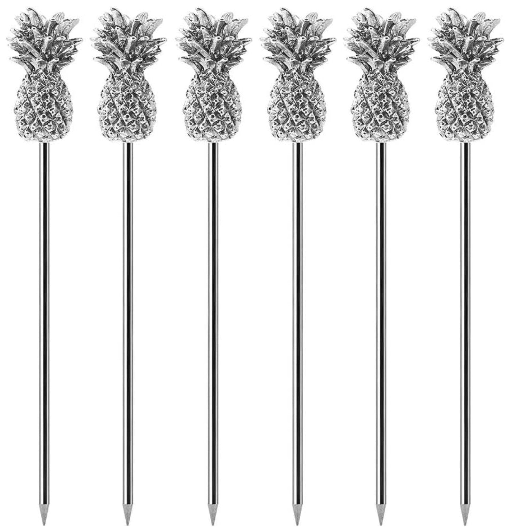 Set of silver pineapple stainless steel stir sticks standing upright