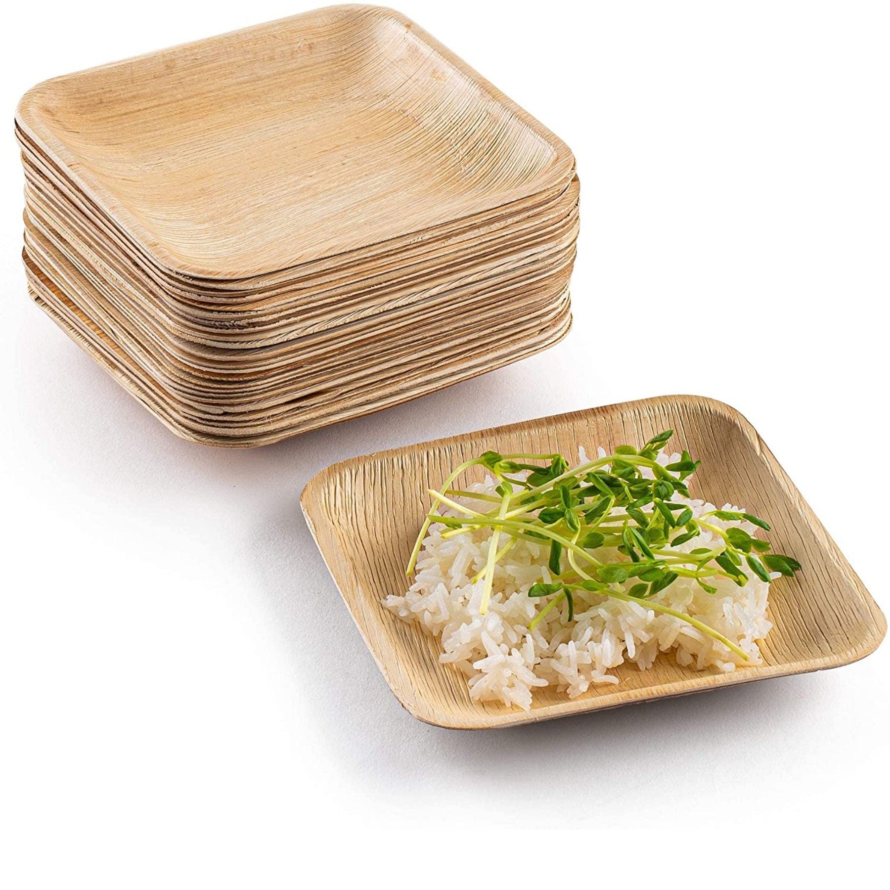 Neatly stacked square bamboo plates with microgreens on top