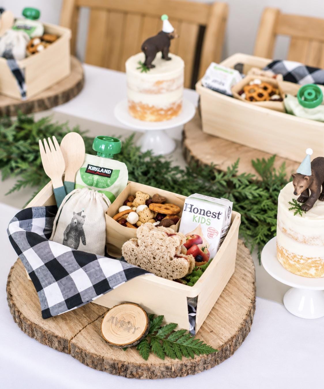 Disposable wooden charcuterie boxes with forks, perfect for serving cheese, fruit, desserts, and individual appetizers at events.