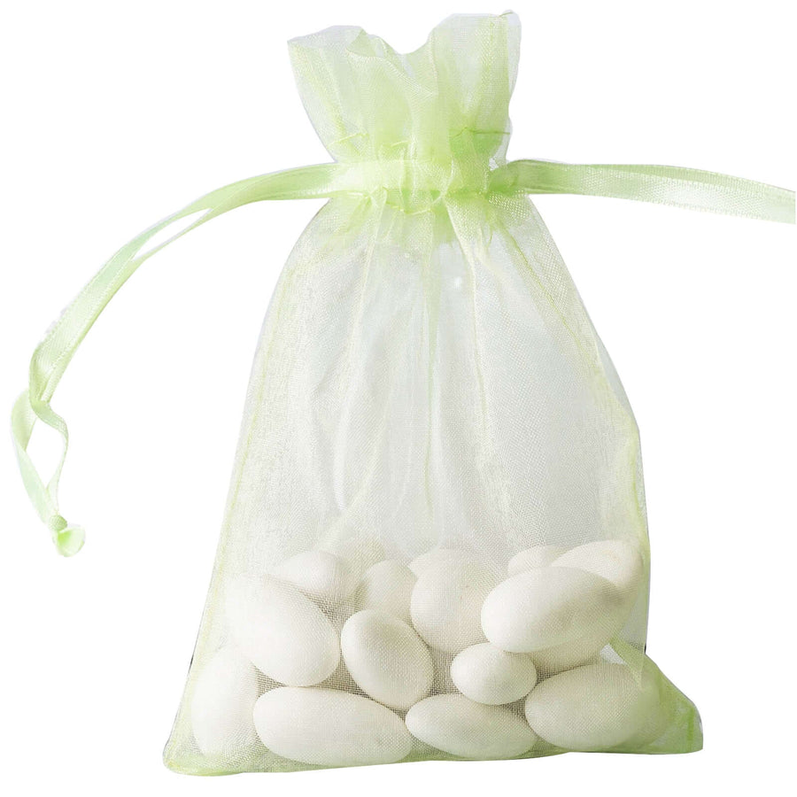 "Elegant mint organza gift bag filled with assorted candies – 4x6 drawstring favor pouch for weddings and special events