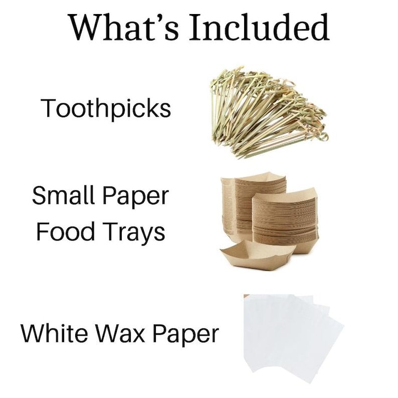 Stack of brown kraft paper food trays with fancy toothpicks set for wedding and event catering.